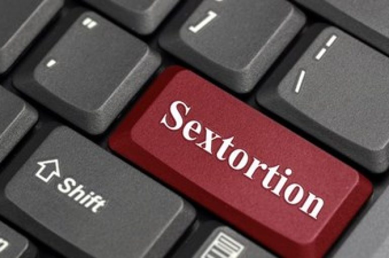 Sextortion Scammers Target Employees